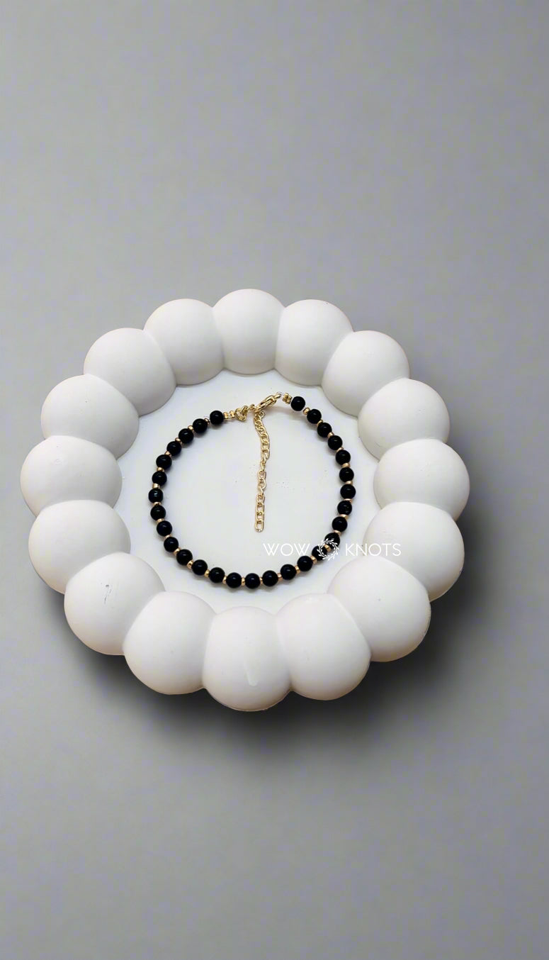 Black Glass Bead with Gold Seed Bead Bracelet
